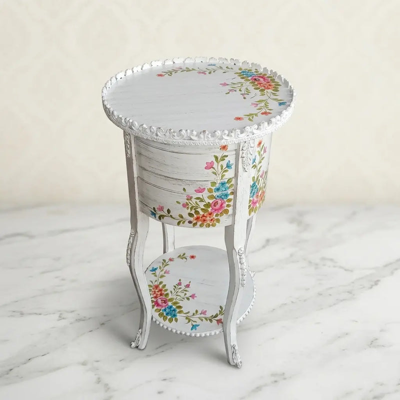 White Distressed Round Table – Multicolor Floral Design